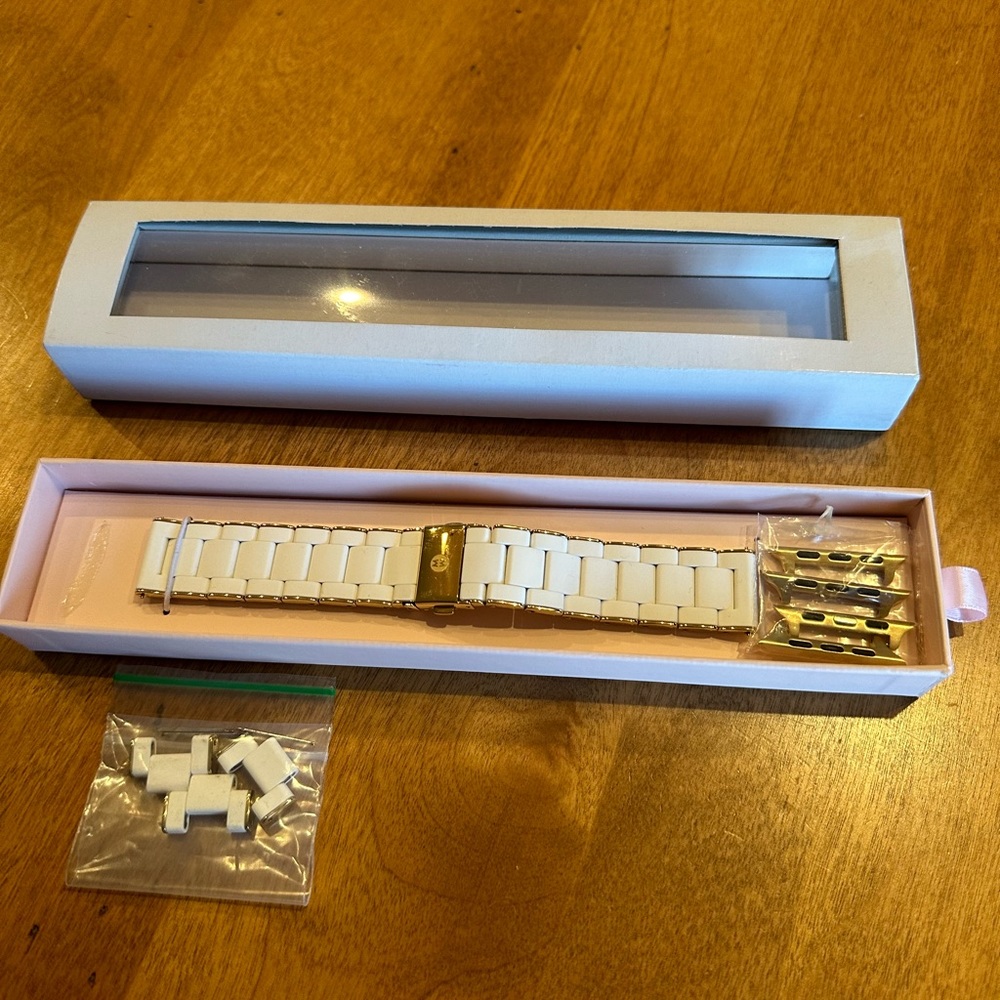 New MICHELE Apple Watch 3-link bracelet strap in white.